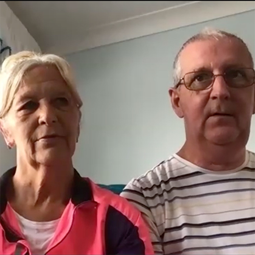 A man and woman in a house