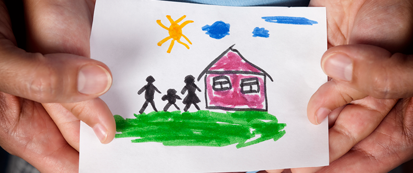 Child's drawing of family outside home