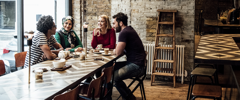 Group of people sitting in coffee shop